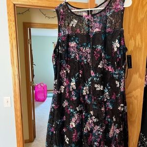 Brand new with tags!Sheer top, knee length,